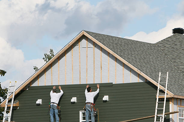 Professional Siding technician working in Pine Hall, NC